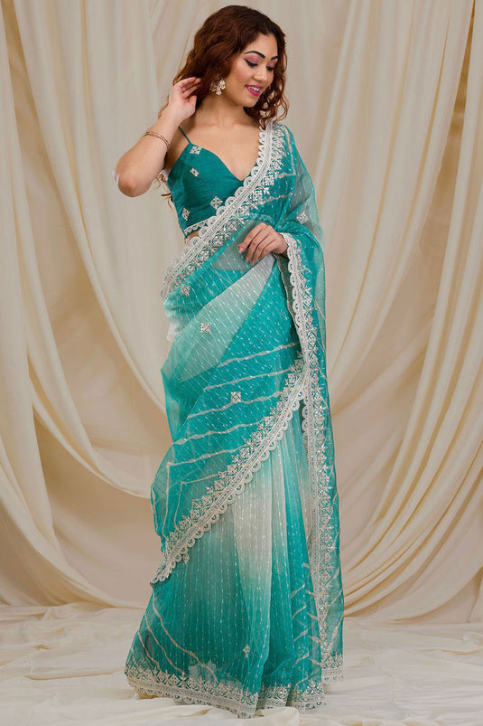 Blazing Cyan Color Fancy Work Party Style Georgette Saree