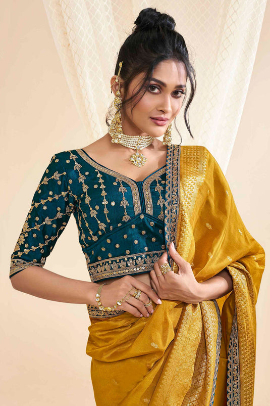 Silk Fabric Sangeet Wear Luxurious Saree In Mustard Color