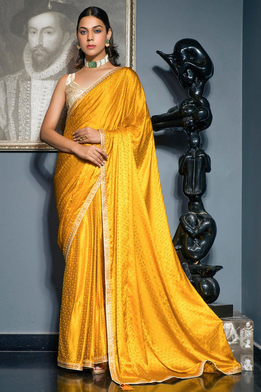 Engaging Yellow Color Silk Fabric Saree With Embroidered Work