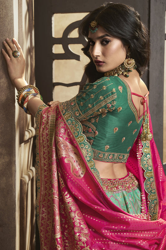 Engaging Sea Green Color Silk Fabric Bridal Lehenga With Sequins Work
