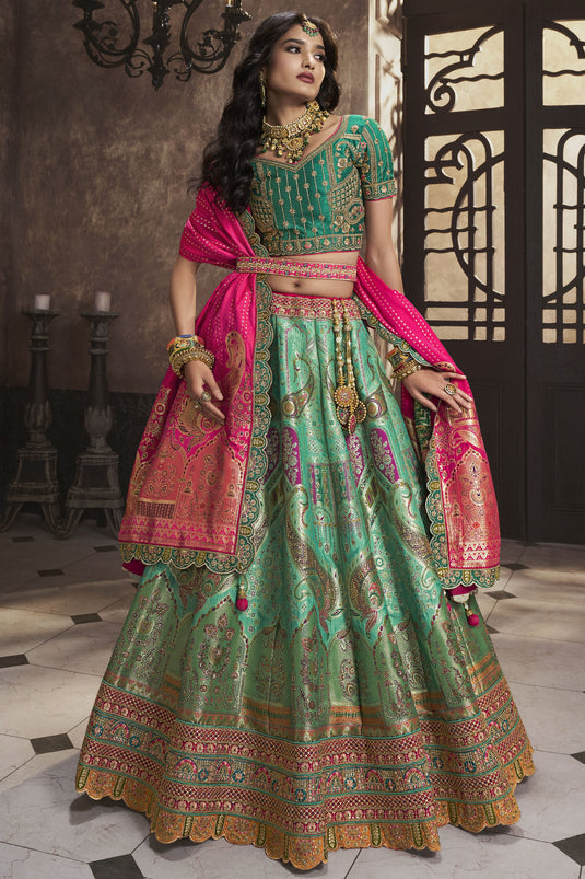 Engaging Sea Green Color Silk Fabric Bridal Lehenga With Sequins Work