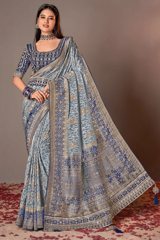 Grey Color Exquisite Silk Saree With Heavy Embroidered Velvet Blouse