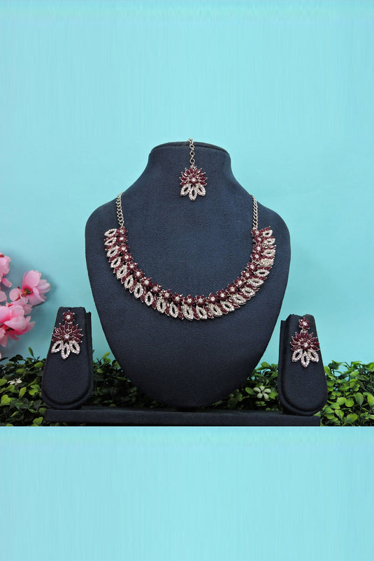 Mesmeric Maroon Color Necklace Set Earrings And Mang Tikka For Women In Alloy Material