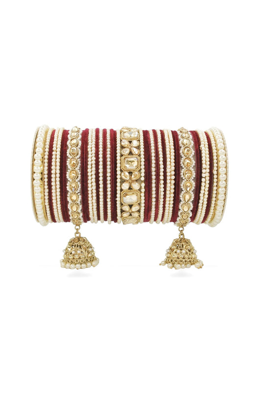 Riveting Alloy Material Jhumki Bridal Set With Pearl Kadas In Maroon Color