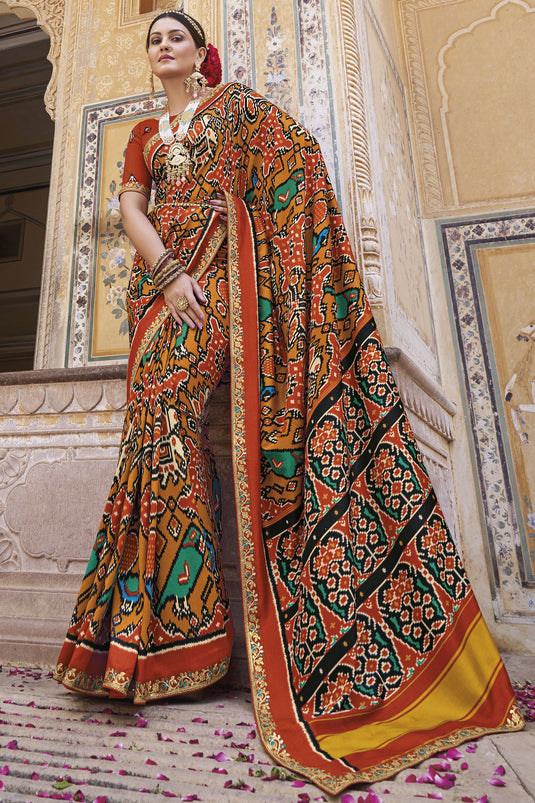 Orange Color Glamorous Printed Patola Silk Saree