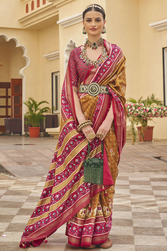 Festive Wear Patola Silk Rust Printed Saree