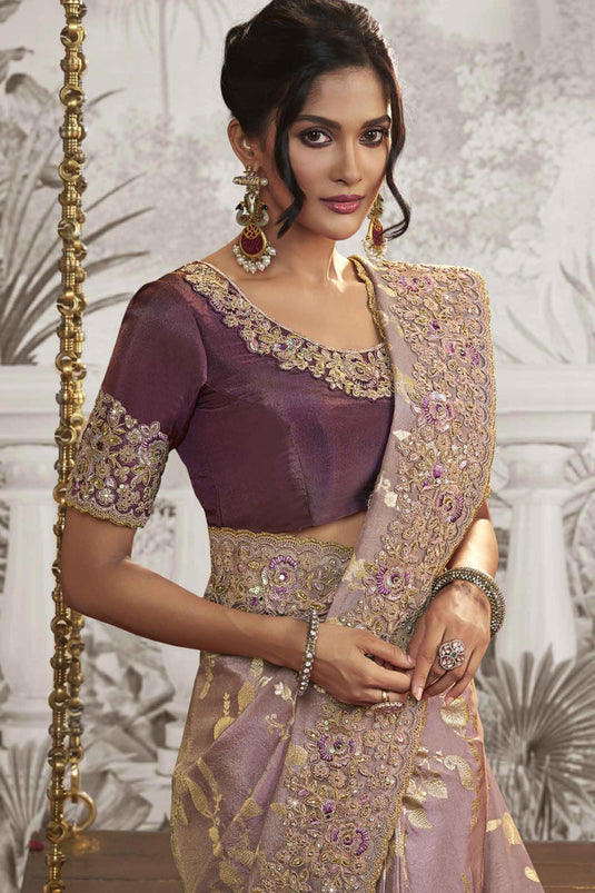 Dazzling Lavender Color Fancy Fabric Heavy Embroidery Work Saree With Party Look Blouse