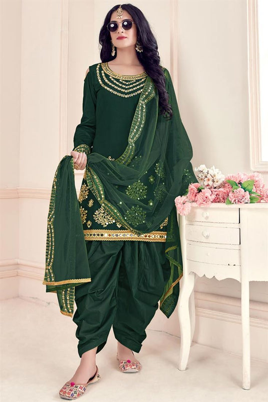 Art Silk Fabric Dark Green Embroidered Festive Wear Patiala Suit