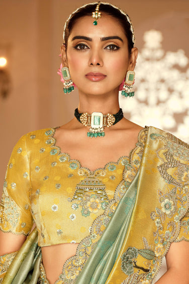 Function Wear Viscose Jacquard Embroidered Border Work Saree In Sea Green Color