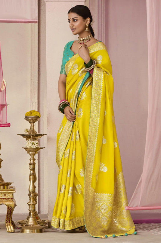 Charming Yellow Silk Festive Saree With Weaving Work