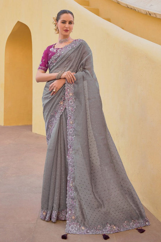 Incredible Border Work On Organza Silk Fabric Grey Color Saree