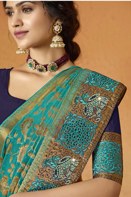 Attractive Embroidered Georgette Saree In Sea Green Color