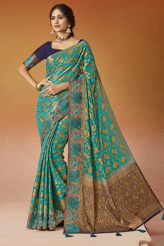 Attractive Embroidered Georgette Saree In Sea Green Color