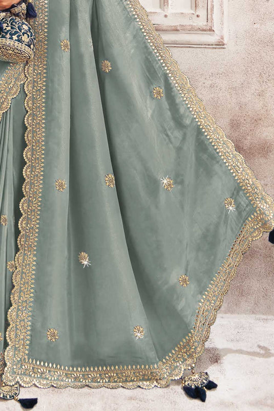 Graceful Organza Grey Color Saree With Border Work