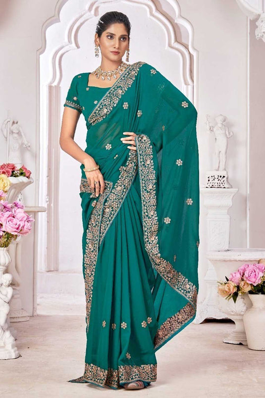 Imposing Georgette Border Work Saree In Sea Green Color