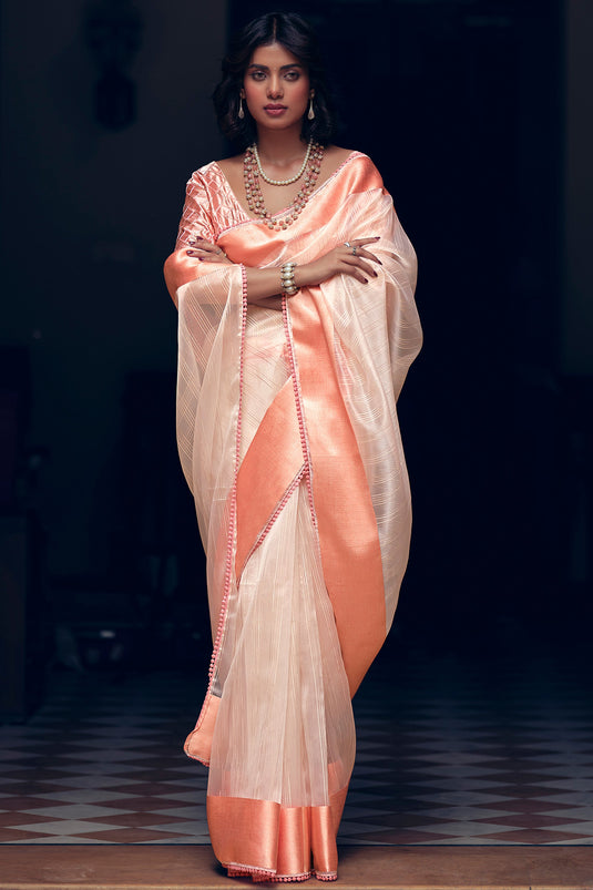 Exquisite Peach Color Organza Festive Wear Saree