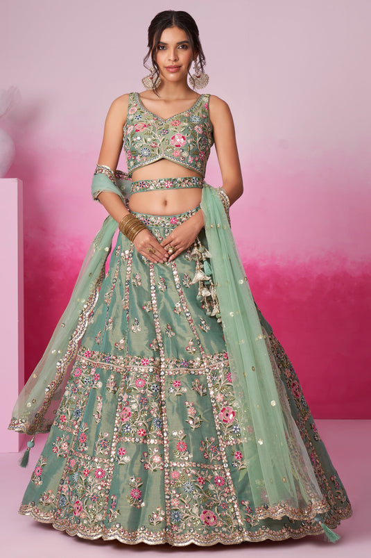 Sea Green Sequins Work Net Fabric Reception Wear Lehenga With Enchanting Blouse