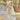 Ornate Heavy Embroidered Bridal Lehenga Choli In Cream Color