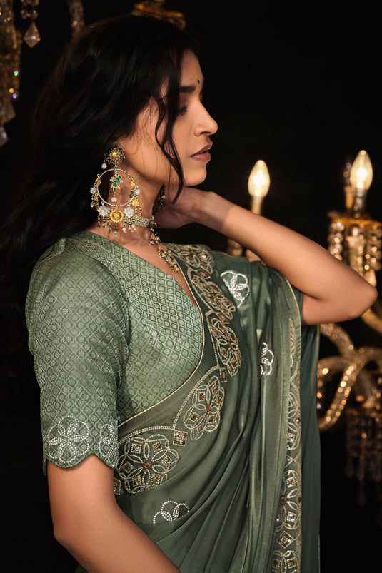 Creative Embroidered Work On Olive Color Tissue Fabric Saree