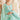 Sea Green Color Net Fabric Enticing Sequins Work Lehenga