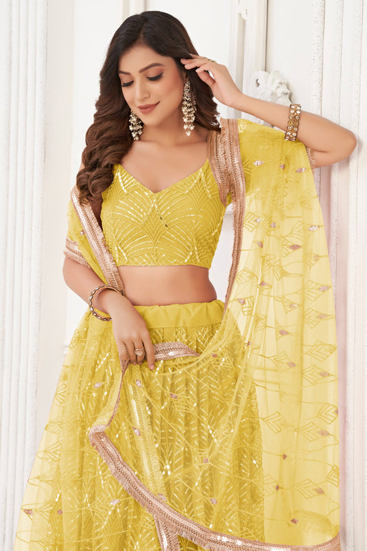 Function Wear Sequins Work Yellow Color Fashionable Lehenga In Net Fabric