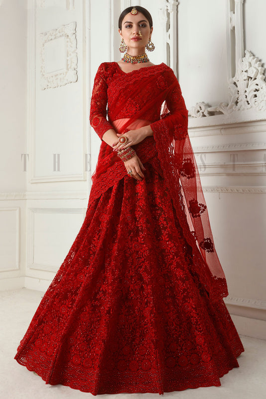 Creative Embroidery Work On Red Color Net Fabric Lehenga