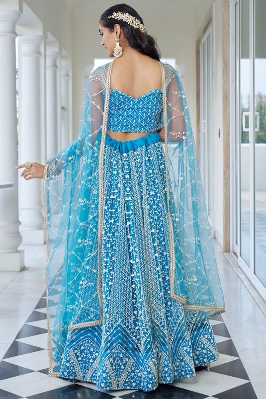 Sangeet Special Cyan Color Net Fabric Sequins Embroidered Lehenga