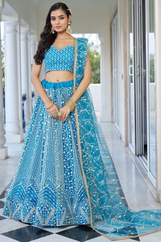 Sangeet Special Cyan Color Net Fabric Sequins Embroidered Lehenga