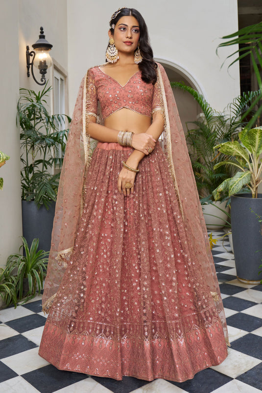 Elegant Peach Color Net Fabric Sangeet Wear Sequins Embroidered Lehenga