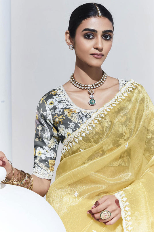 Marvellous Border Work On Organza Fabric Saree In Yellow Color