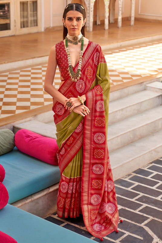 Charming Olive Color Art Silk Fabric Patola Printed Saree