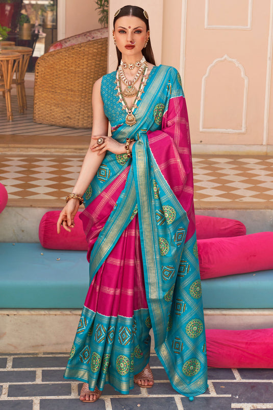 Radiant Rani Color Art Silk Fabric Patola Printed Saree