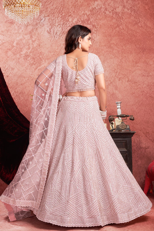 Net Fabric Bridal Lehenga Choli With Embroidery Work In Pink Color