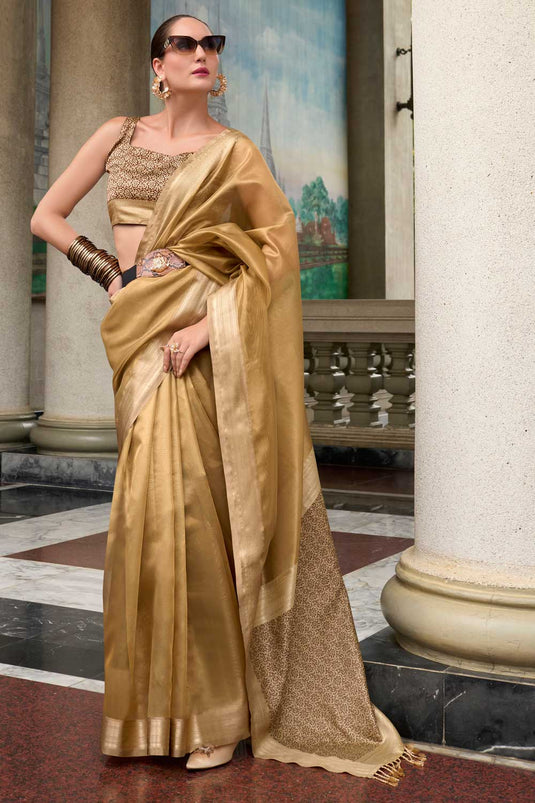 Appealing Weaving Work On Tissue Silk Fabric Saree In Cream Color