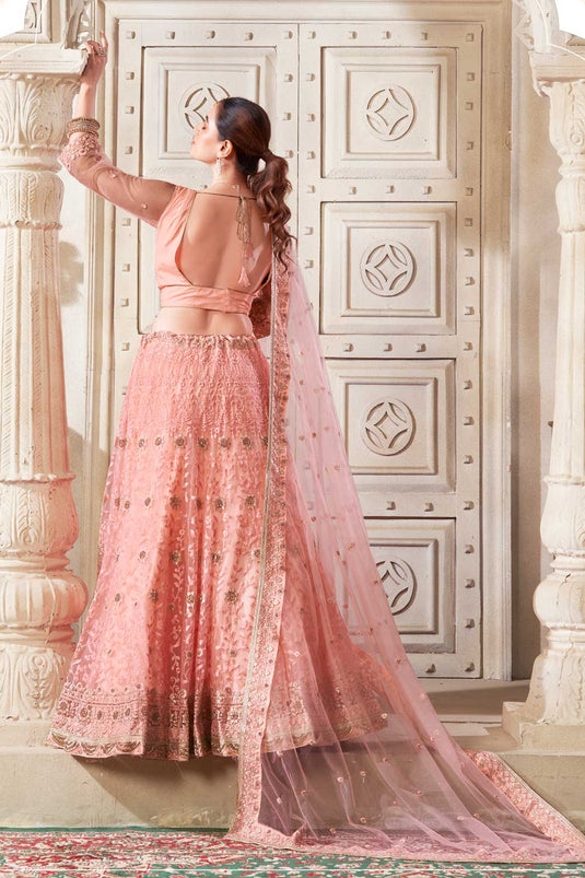 Net Fabric Peach Color Beatific Look Lehenga