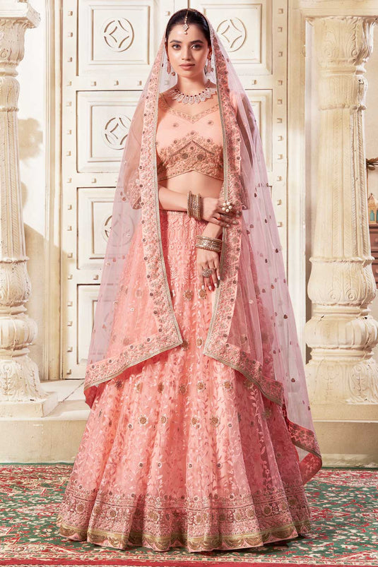 Net Fabric Peach Color Beatific Look Lehenga