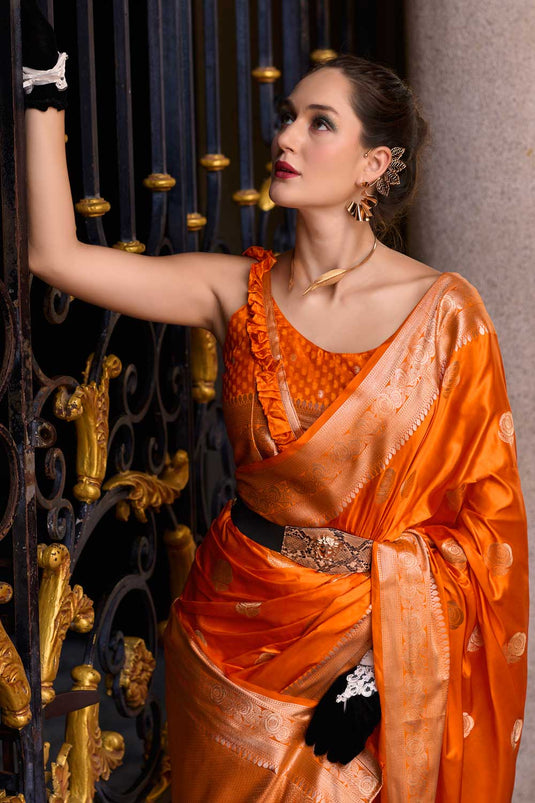 Remarkable Weaving Patterns on Orange Color Satin Silk Saree