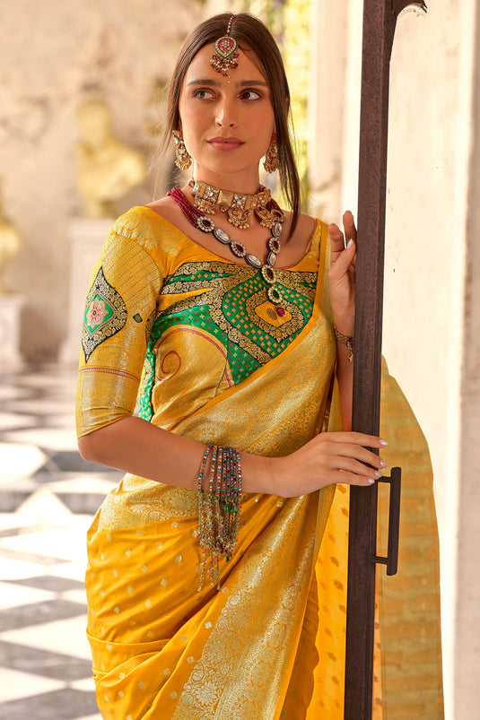 Radiant Yellow Soft Silk Zari Weaving Festive Saree