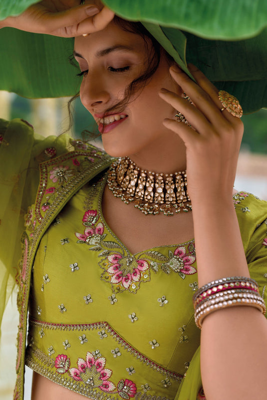 Silk Symphony Bridal Lehenga Choli In Green Color