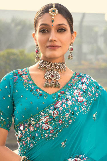 Blazing Cyan Color Embroidered Thread Work Crepe Saree