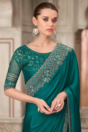 Teal Satin Silk Party Style Luminous Lace Border Work Saree With Designer Blouse