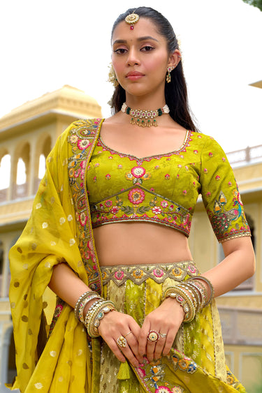 Lovely Heavy Embroidered Wedding Lehenga Choli In Green Color