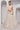 Off White Color Net Fabric Coveted Lehenga With Sequins Work