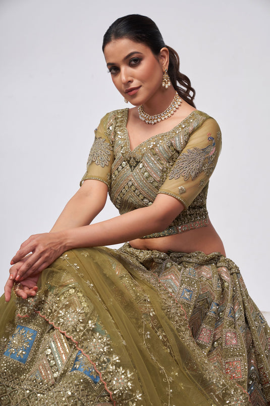 Sequins Work On Olive Color Sober Lehenga In Net Fabric