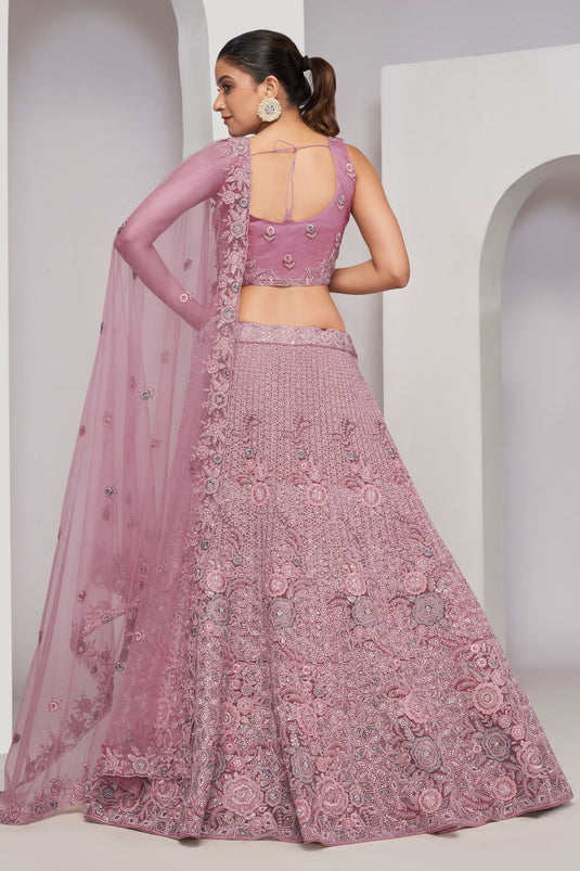 Beguiling Sequins Work On Lavender Color Net Fabric Lehenga