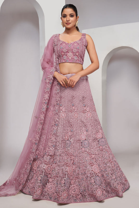 Beguiling Sequins Work On Lavender Color Net Fabric Lehenga