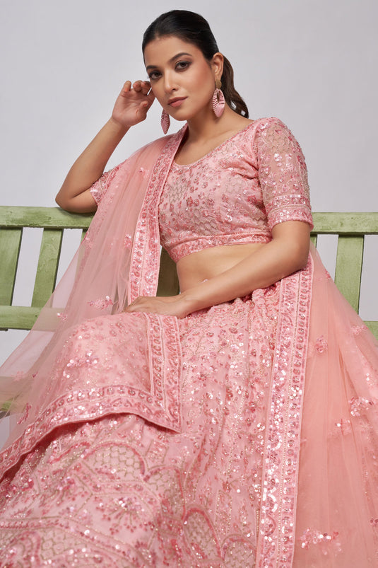 Trendy Net Fabric Pink Color Lehenga With Sequins Work