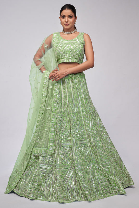 Marvellous Sequins Work On Net Fabric Lehenga In Sea Green Color