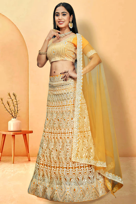 Charming Yellow Color Net Fabric Sequins Work Lehenga