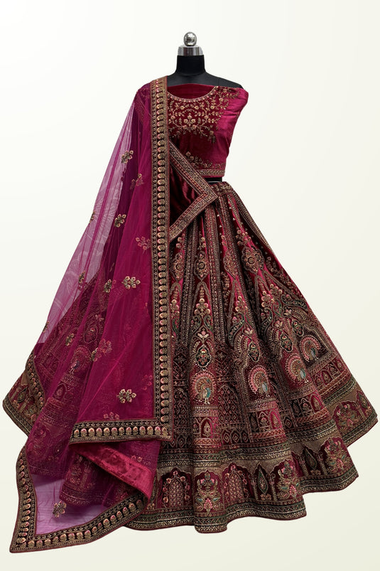 Velvet Fabric Wedding Wear Charismatic Embroidered Bridal Lehenga In Maroon Color
